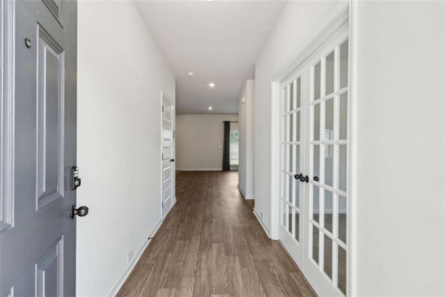 1130 Lyndhurst Ln, Bethlehem, GA 30620 - hall featuring wood finished floors, french doors, and recessed lighting