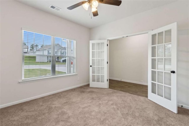 1130 Lyndhurst Ln, Bethlehem, GA 30620 - unfurnished room with french doors, carpet floors, and ceiling fan