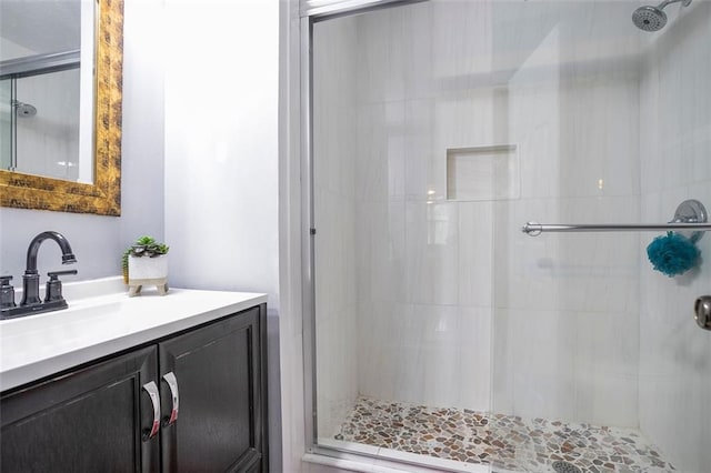 bathroom with vanity and an enclosed shower