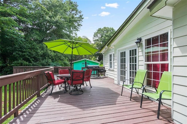 deck featuring french doors and grilling area