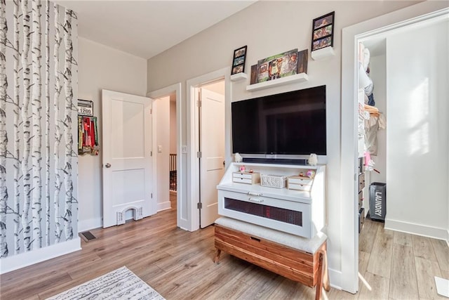 interior space with light hardwood / wood-style floors