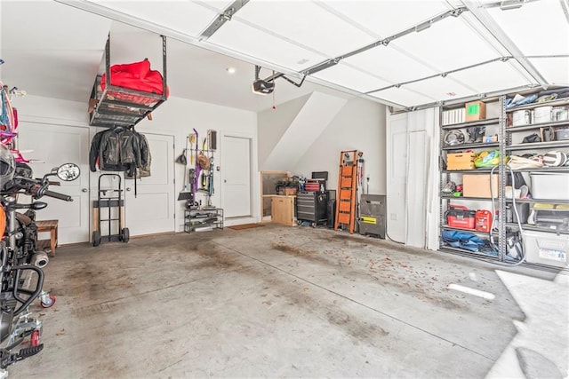 garage featuring a garage door opener