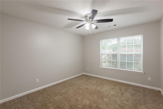 4045 Meadow Glen Way, Fairburn, GA 30213 - spare room featuring baseboards, carpet flooring, a ceiling fan, and a textured ceiling