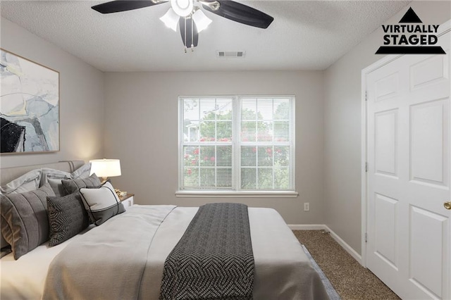4045 Meadow Glen Way, Fairburn, GA 30213 - carpeted bedroom with baseboards, a ceiling fan, visible vents, and a textured ceiling