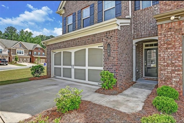 property entrance with a garage