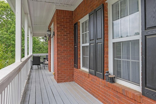 wooden deck featuring a porch