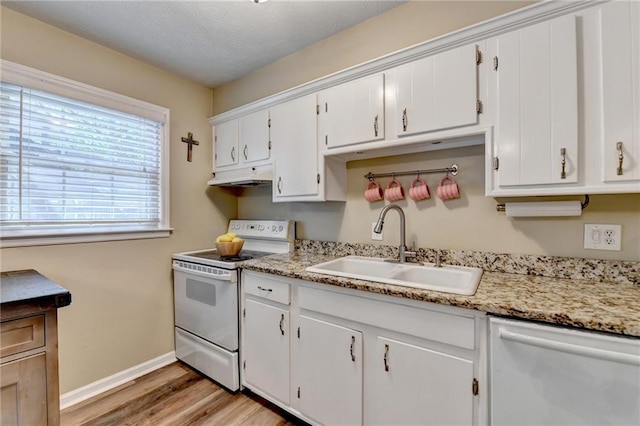 6700 Roswell Rd Unit 22B, Atlanta, GA 30328 - kitchen with white electric range oven, a sink, dishwashing machine, under cabinet range hood, and light wood finished floors