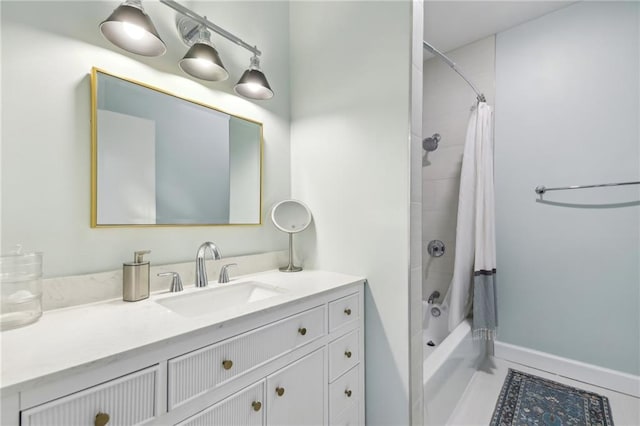 bathroom with shower / bath combination with curtain and vanity