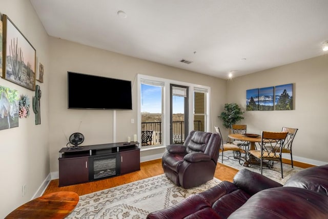 living room featuring light wood-type flooring