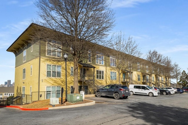 view of building exterior with central air condition unit