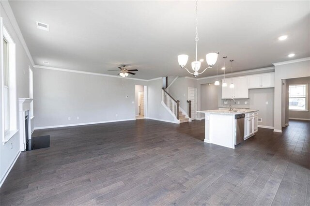 113 Canal St, Hampton, GA 30228 - kitchen featuring ornamental molding, stainless steel dishwasher, a kitchen island with sink, a ceiling fan, and open floor plan