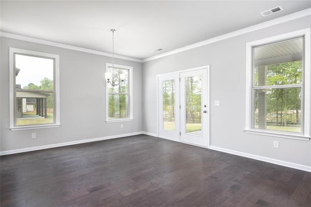 113 Canal St, Hampton, GA 30228 - spare room featuring a chandelier, plenty of natural light, dark wood finished floors, and crown molding
