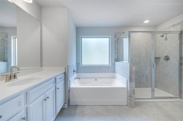 113 Canal St, Hampton, GA 30228 - full bathroom featuring vanity, a bath, a shower stall, tile patterned flooring, and recessed lighting
