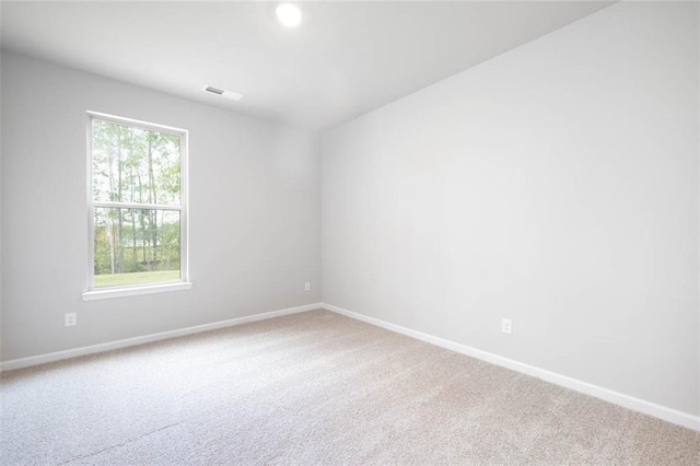 113 Canal St, Hampton, GA 30228 - spare room featuring carpet flooring, baseboards, and recessed lighting