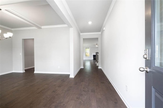 113 Canal St, Hampton, GA 30228 - foyer entrance with dark wood-style flooring, a chandelier, baseboards, crown molding, and ceiling fan