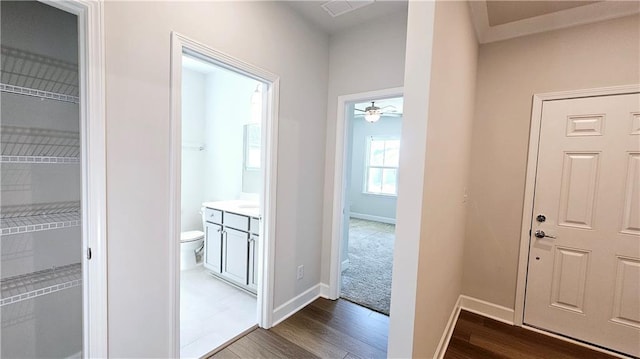 hall featuring dark wood-type flooring