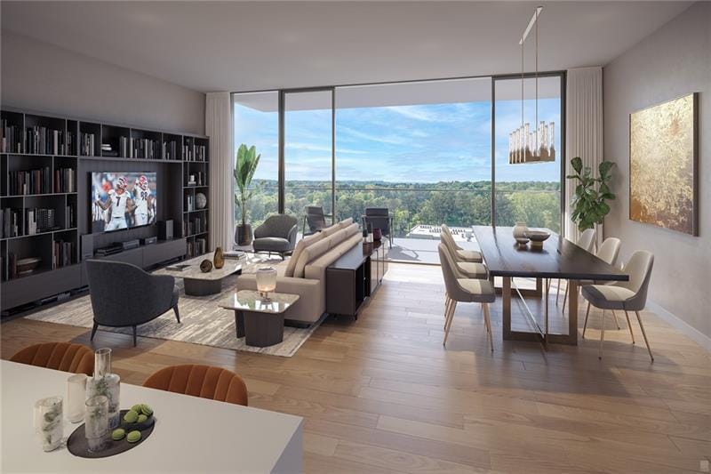 living room featuring light wood-type flooring and a wall of windows