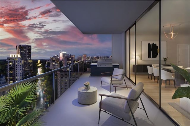 balcony at dusk featuring outdoor lounge area