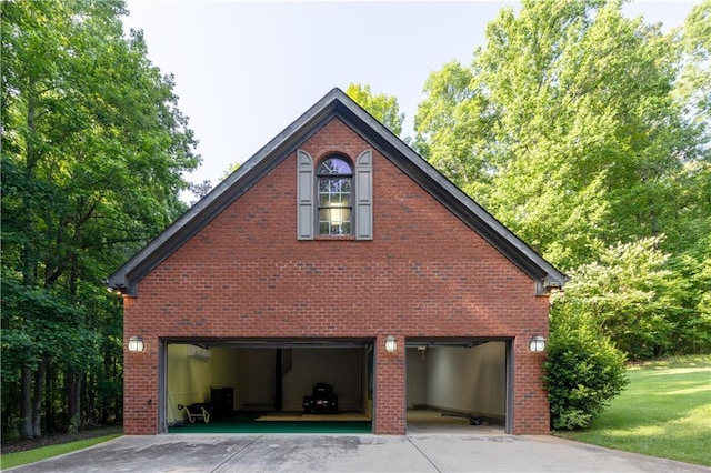 540 Branch Dr, Pendergrass, GA 30567 - view of property exterior with driveway, an attached garage, and brick siding