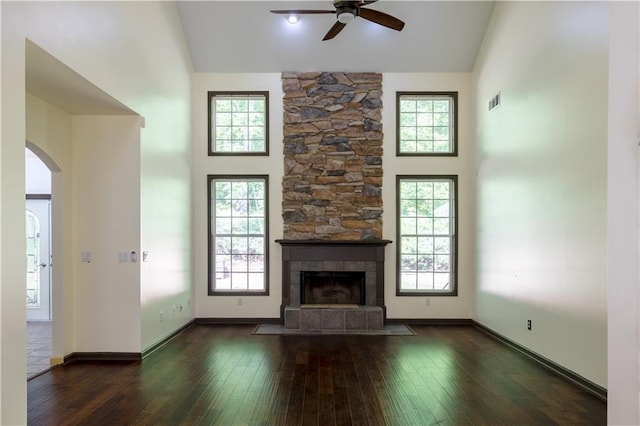 540 Branch Dr, Pendergrass, GA 30567 - unfurnished living room featuring ceiling fan, plenty of natural light, dark wood-style flooring, and high vaulted ceiling