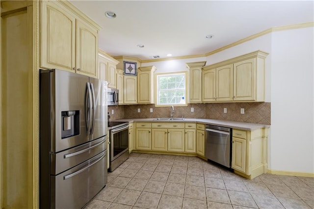 540 Branch Dr, Pendergrass, GA 30567 - kitchen with appliances with stainless steel finishes, light brown cabinets, and ornamental molding