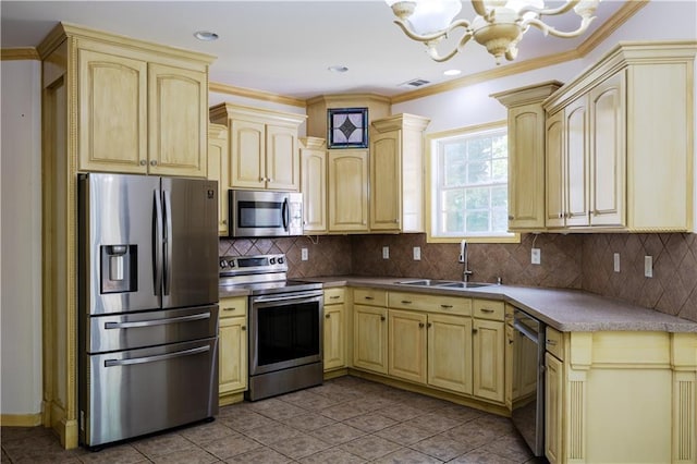 540 Branch Dr, Pendergrass, GA 30567 - kitchen with stainless steel appliances, a chandelier, light tile patterned flooring, cream cabinets, and backsplash