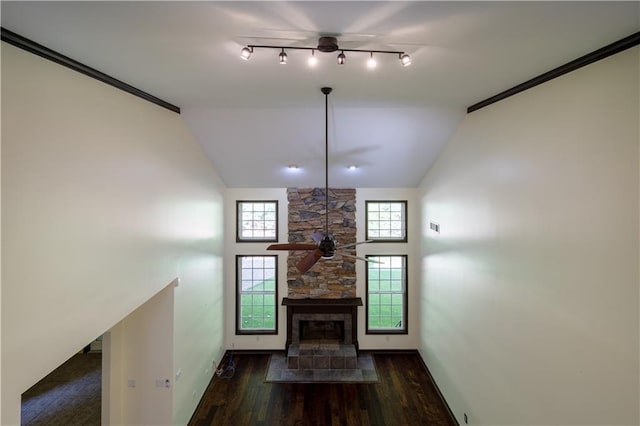 540 Branch Dr, Pendergrass, GA 30567 - unfurnished living room featuring ceiling fan, wood finished floors, lofted ceiling, and a stone fireplace