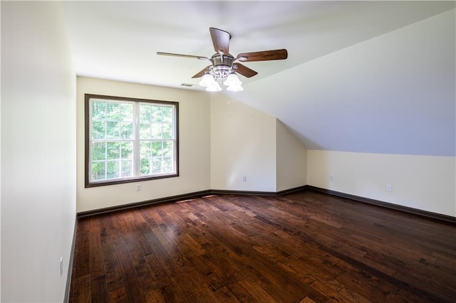 540 Branch Dr, Pendergrass, GA 30567 - bonus room with dark wood-style flooring, vaulted ceiling, and a ceiling fan