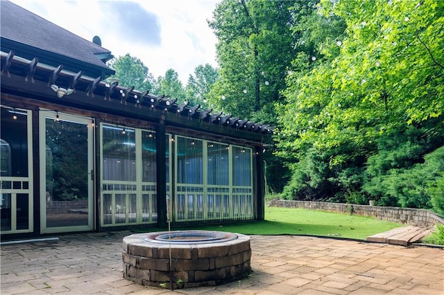 540 Branch Dr, Pendergrass, GA 30567 - view of patio featuring an outdoor fire pit