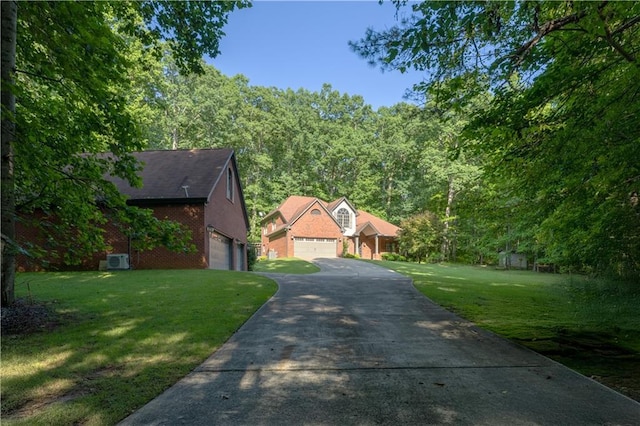 540 Branch Dr, Pendergrass, GA 30567 - view of front of property featuring a garage, a front lawn, brick siding, and driveway