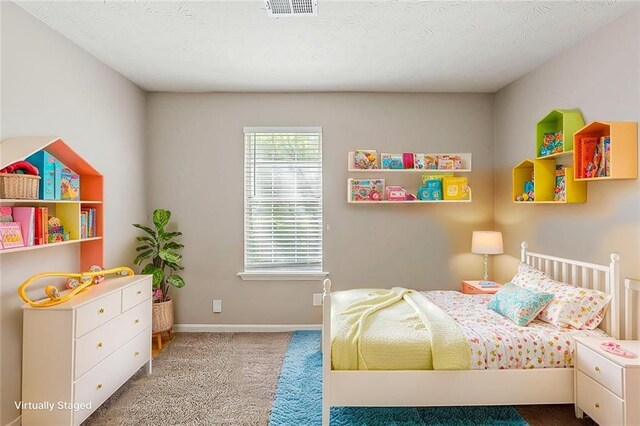 5786 Longbow Dr, Stone Mountain, GA 30087 - carpeted bedroom with baseboards