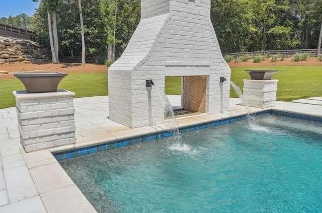 swimming pool featuring a patio area