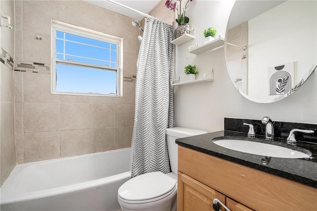 full bathroom with shower / bath combo, vanity, and toilet