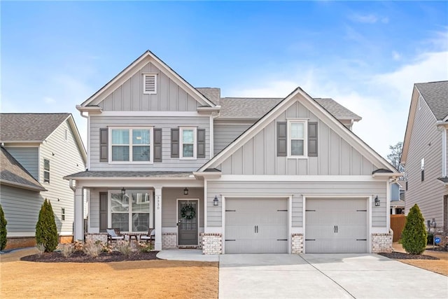 craftsman house featuring a porch, a shingled roof, concrete driveway, board and batten siding, and a garage