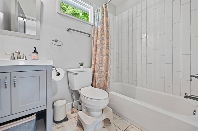670 Parker Ave, Decatur, GA 30032 - full bathroom featuring vanity, toilet, marble finish floors, and shower / bathtub combination with curtain