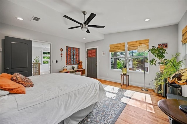 670 Parker Ave, Decatur, GA 30032 - bedroom with multiple windows, light wood-type flooring, baseboards, recessed lighting, and a ceiling fan