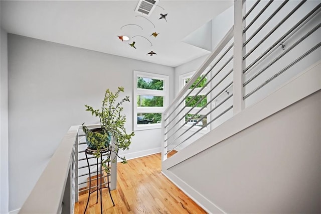 670 Parker Ave, Decatur, GA 30032 - stairs featuring baseboards and wood finished floors