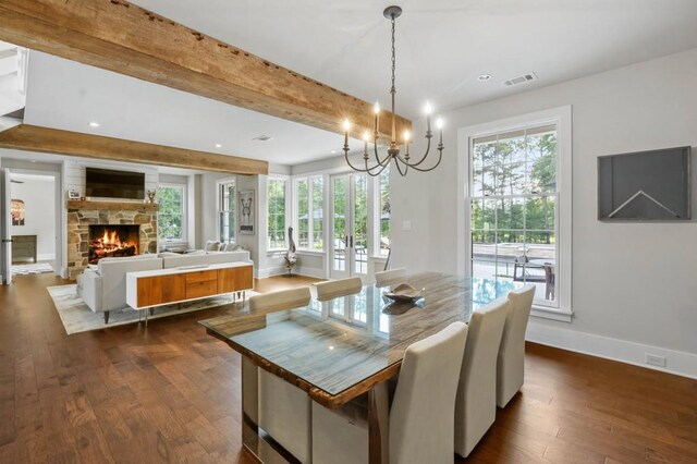 dining room with dark wood-style floors, baseboards, healthy amount of natural light, a chandelier, and recessed lighting