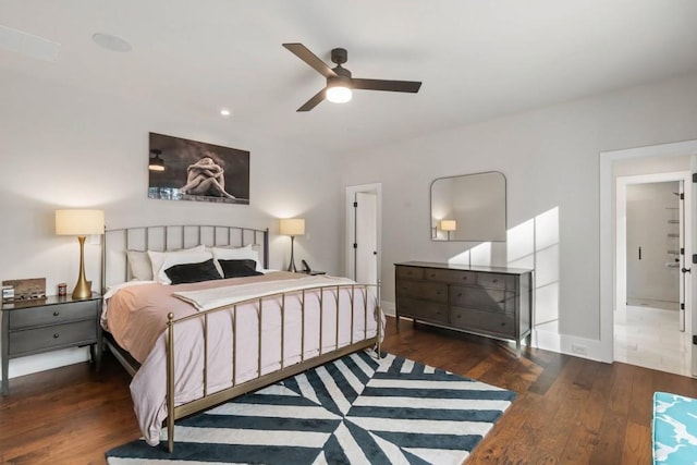 bedroom featuring wood finished floors, recessed lighting, baseboards, and a ceiling fan