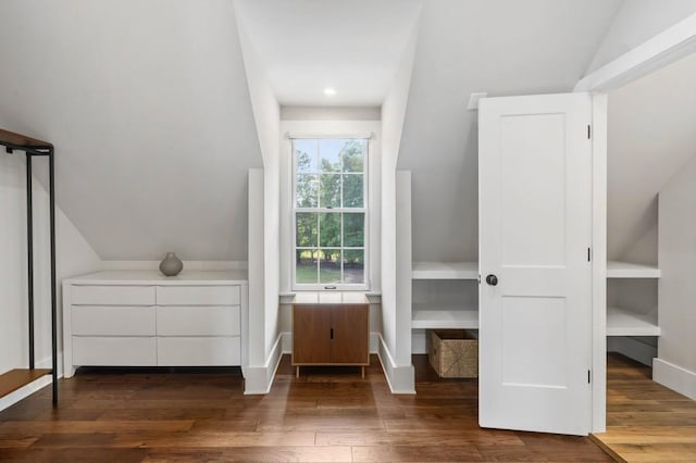 bedroom featuring dark wood-style flooring, lofted ceiling, recessed lighting, and baseboards