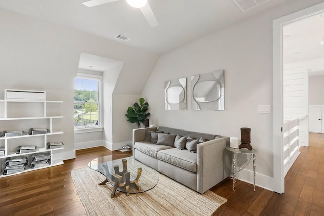 living room with wood-type flooring, baseboards, ceiling fan, and lofted ceiling