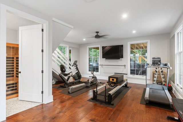 exercise area with ceiling fan, recessed lighting, and wood finished floors