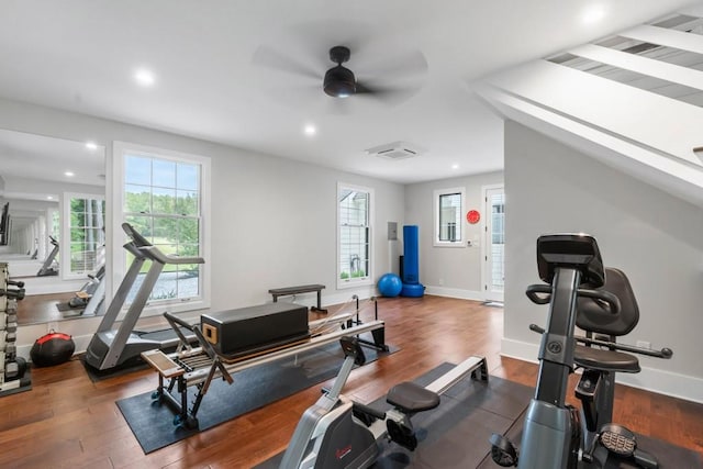 exercise room featuring a ceiling fan, wood finished floors, healthy amount of natural light, and recessed lighting