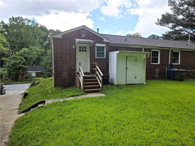 1753 Cahoon St SW, Atlanta, GA 30310 - view of front of home featuring brick siding and a front lawn