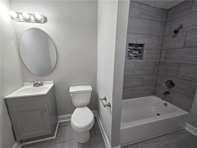 1753 Cahoon St SW, Atlanta, GA 30310 - bathroom featuring tile patterned floors, toilet, baseboards, vanity, and shower / tub combination