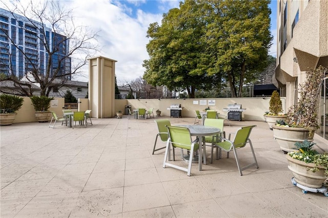 view of patio with a grill