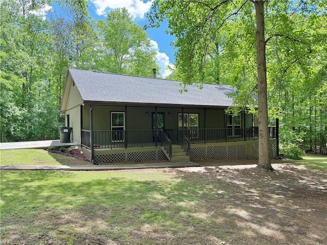 93 Mill Creek Rd, Hiram, GA 30141 - single story home with a shingled roof, a porch, and a front lawn