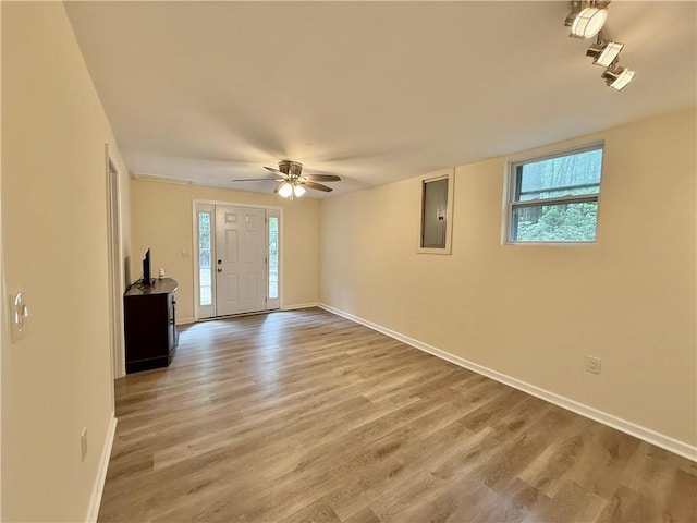 93 Mill Creek Rd, Hiram, GA 30141 - interior space with electric panel, light wood-style flooring, baseboards, and a healthy amount of sunlight