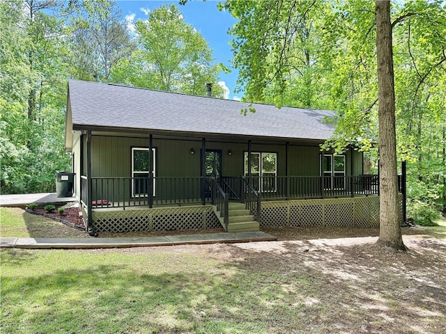 93 Mill Creek Rd, Hiram, GA 30141 - view of front of home featuring a shingled roof, board and batten siding, and a porch