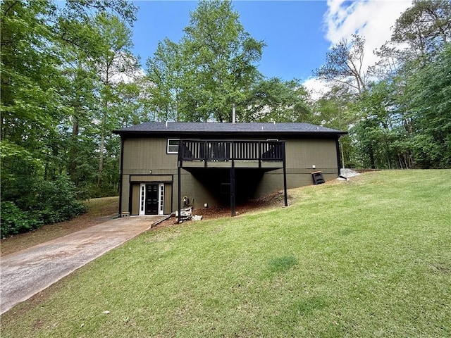 93 Mill Creek Rd, Hiram, GA 30141 - back of house featuring concrete driveway, a deck, and a lawn
